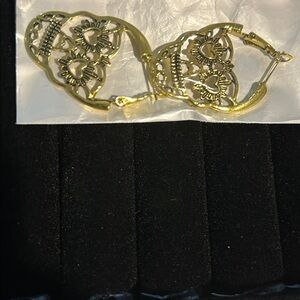 Skull earrings, gold, new in packaging